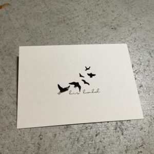 postkarte mit ausgeschnittenen voegel